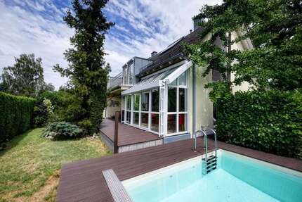 Haus zum Kaufen in Gröbenzell 1.290.000,00 € 156 m²