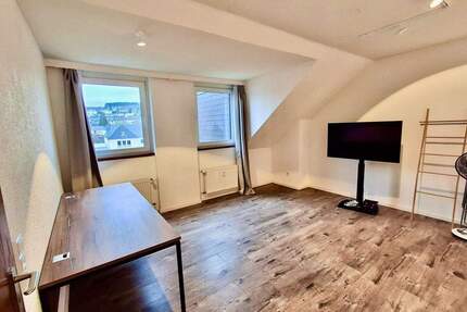 RESERVIERT! - 2 Zimmer-Eigentumswohnung direkt am Rathausplatz in Konz mit Einbauküche, Aufzug und Tiefgaragenplatz