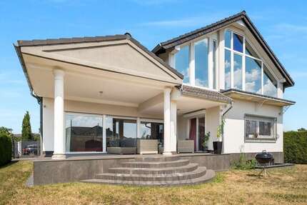 Haus zum Kaufen in Heusenstamm 1.290.000,00 € 250 m²