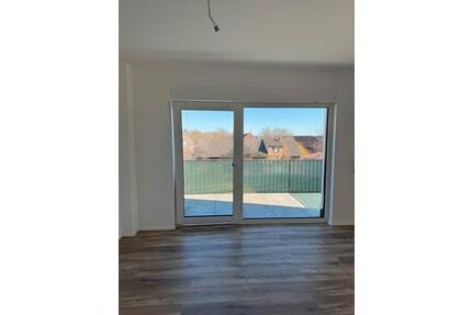 Moderne 2 ZDG-Wohnung mit Balkon | FBH | Top Lage Ahnatal