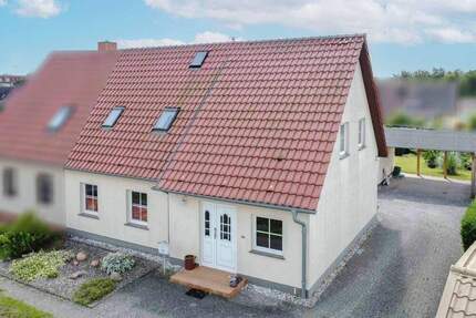 Modernisierte Doppelhaushälfte mit Anbau, Photovoltaik und schönem Garten in Tribsees