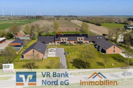 Grünes Quartier Klixbüll: Verkauf einer 2-Zi.-DG-Eigentumswohnung in KfW-40-Standard mit Carport