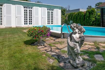Charmanter Bungalow mit offener Wohnlandschaft, Kamin und Gartenidylle - Heusenstamm