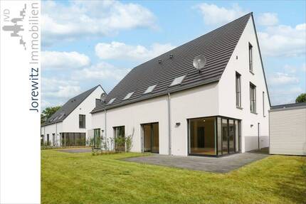 Erstbezug Bi-Senne: Moderne Doppelhaushälfte (KfW-Effizienzhaus 55) mit Carport, Terrasse und Garten - Bielefeld