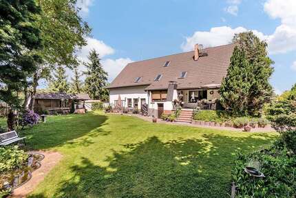 Haus zum Kaufen in Oranienburg-OT Wensickendorf 398.000,00 € 189.95 m²