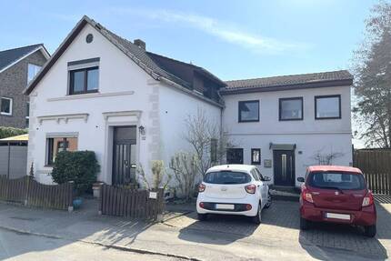 PURNHAGEN-IMMOBILIEN - Gepflegtes 3-Familienhaus auf großem Grundstück in ruhiger Lage von Fähr-Lobbendorf! - Bremen