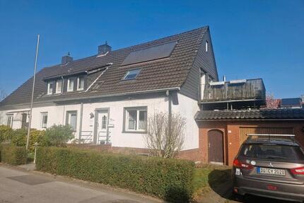 Doppelhaushälfte mit attraktiven Mieteinnahme bei vermietetem OG - Duisburg Rheinhausen