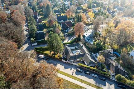 Aigner - Rarität am Isarhochufer: Bungalow mit Atrium in privilegierter Lage von Grünwald