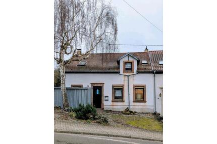 Doppelhaushälfte in Köllerbach mit Garten in zentraler Lage - Püttlingen