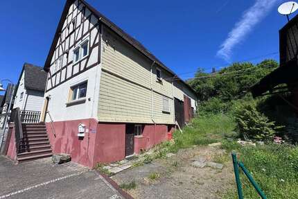 Haus zum Kaufen in Dillenburg - Nanzenbach 99.000,00 € 115 m²