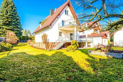 Investieren in die Zukunft: Einfamilienhaus mit Potenzial und weiterem Bauplatz in Unterföhring
