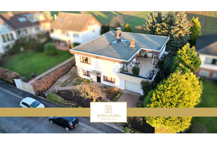 Schöner Bungalow in Feldrandlage mit großer Terrasse, Einliegerwohnung & Doppelgarage - Karben Klein-Karben