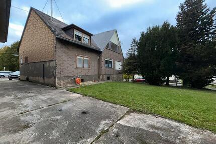 Charmantes Mehrfamilienhaus mit Halle & Apartment in Toplage - Holzhausen an der Haide