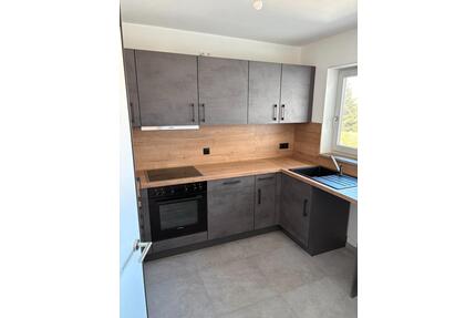 Sanierte 2-Zimmer-Obergeschosswohnung mit Terrasse und Garage in - Mogendorf