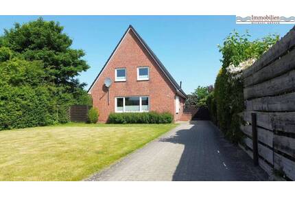 Ihr neues Zuhause: Helles Einfamilienhaus mit Gartenidylle in zweiter Baureihe - Husum