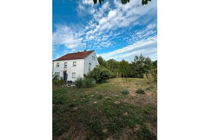 Haus mit 2 Garagen und Grundstück für 2 DHH - Hösbach