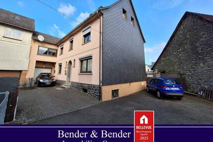 Solides Doppelhaus mit Ladenlokal in zentraler Lage in Rennerod!