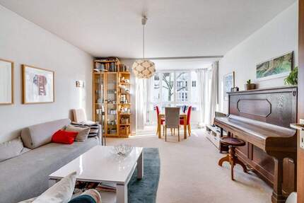 AIGNER - Charmante 3-Zimmer-Wohnung mit zwei Balkonen in Ottobrunn