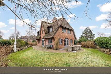 Großzügige Haushälfte unter Reet mit Einzelhauscharakter in Kampen