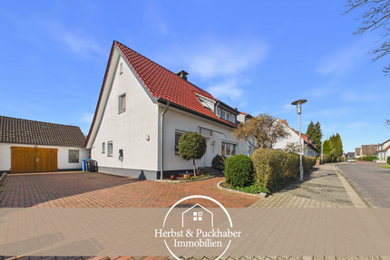 Haus zum Kaufen in Osterholz-Scharmbeck 265.000,00 € 102 m²