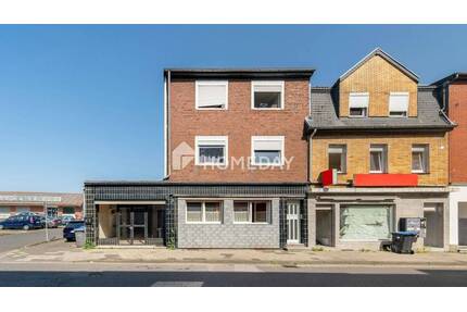 Solides Mehrfamilienhaus mit freier Gewerbefläche, Terrasse, Balkon und Stellplätzen in Alsdorf