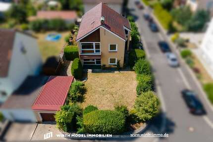 Haus zum Kaufen in Niederwerrn 325.000,00 € 151 m²