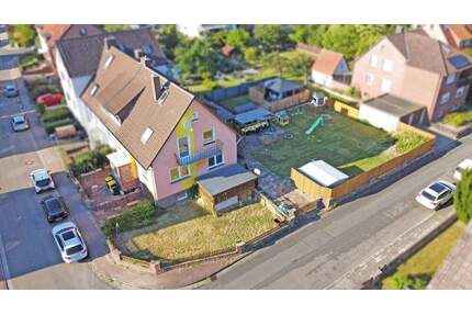 Garbsen-Berenbostel - Zweifamilien-DHH mit gr. Garten & 2 Garagen