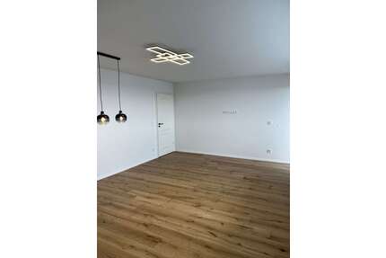 Wohnung zum Kaufen in Putzbrunn 369.000,00 € 61.84 m²