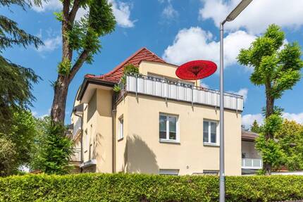AIGNER - Lichtdurchflutete Dachgeschosswohnung mit sonnigem Balkon - München Laim