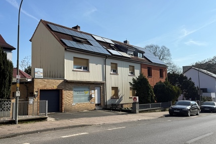 Mehrfamilienhaus mit Ladeneinheit und Entwicklungspotenzial auf großzügigem Grundstück in Frankfurt-Nieder Eschbach - Frankfurt am Main