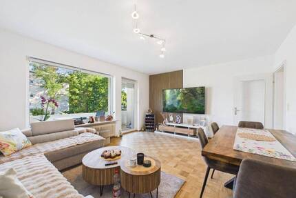 Fernwärme, Stellplatz und solide Miete - Ottobrunn