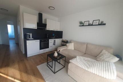 2-Zimmer Neubau mit Einbauküche, Balkon, Möblierung & Tiefgarage - Bubenreuth