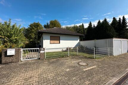 Ebenerdiges Einfamilienhaus auf großem Grundstück in Kronberg - Kronberg im Taunus