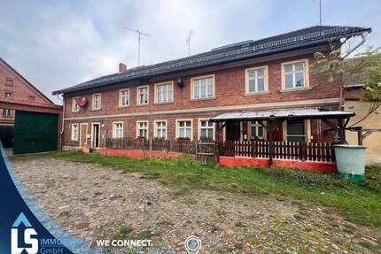 Vierseitenhof mit 5 WE und Garagen in Heeren - Stendal