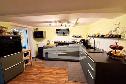 Gepflegtes Mehrfamilienhaus mit 4 Wohneinheiten sowie Garten und Innenhofterrasse - Trier / Euren