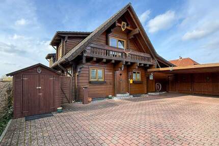 Ein Traum für Holzliebhaber - gemütliches Blockbohlenhaus - Moorrege