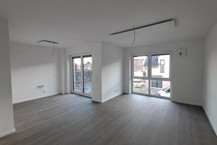 Erstbezug! 4-Zimmer-Neubau-Wohnung im 1.OG mit Balkon, Garderobenraum in Schiffdorf-Spaden.