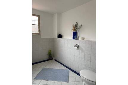 Höchberg - Wohn.- und Geschäftshaus