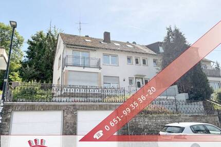 Dreifamilienhaus in Trier-Olewig: Garten, 2 Garagen, voll unterkellert