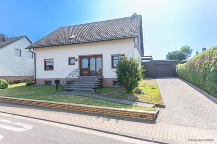 Exklusives Wohnen in Berus - Charmantes Einfamilienhaus mit Garage in idyllischer Sonnenlage - Überherrn