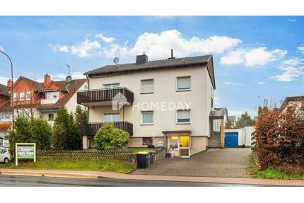 Einfamilienhaus mit zwei Wohnbereichen, großer Garage und BüroGewerbefläche - Schauenburg Elgershausen