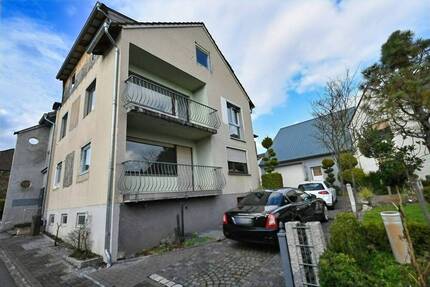 Mehrfamilienhaus mit 4 Wohneinheiten, Scheune und Garten - Dahlheim