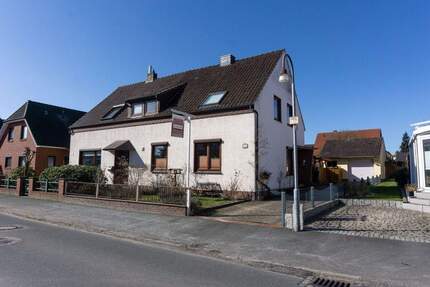 PURNHAGEN-IMMOBILIEN - Gepflegte Doppelhaushälfte mit Garage in ruhiger Lage von Blumenthal-Bockhorn - Bremen / Bockhorn Lüssum-Bockhorn