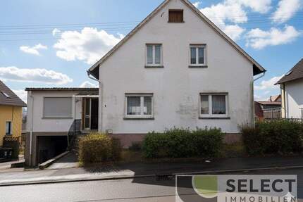 Freistehendes Ein- bis Zweifamilienhaus mit Garten und Garage - Ottweiler / Fürth