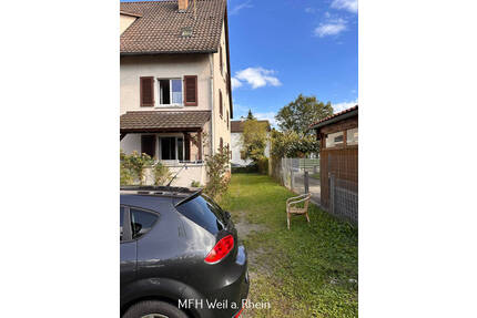 Grenznahes Mehrfamilienhaus mit 9 Wohneinheiten, großem Garten und viel Potential - Weil am Rhein