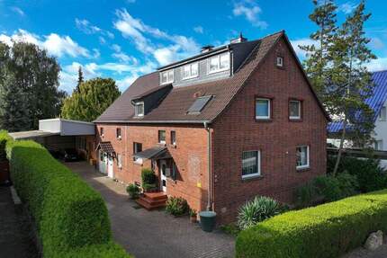 2-Familienhaus mit Einliegerwohnung und 165 m² Gewerbeeinheit. 10 Stellplätze und schöner Garten - Selm