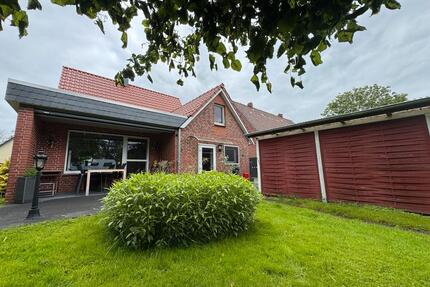 Charmantes Einfamilienhaus mit Garage, Carport und großem Garten - Butjadingen
