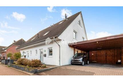 Raum für die ganze Familie: Doppelhaushälfte mit Carport und Garten - Pinneberg