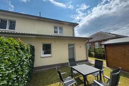 Schmucke Doppelhaushälfte auf Eigenland mit Terrasse zu verkaufen - Grömitz