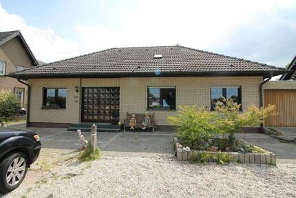 Bungalow mit großem Grundstück, Wintergarten und Einliegerwohnung in Ossenberg - Rheinberg